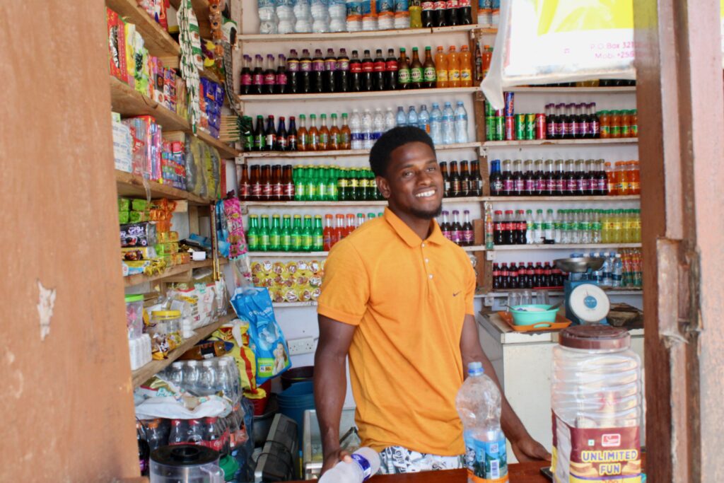 A man in a shop in a village in Pemba